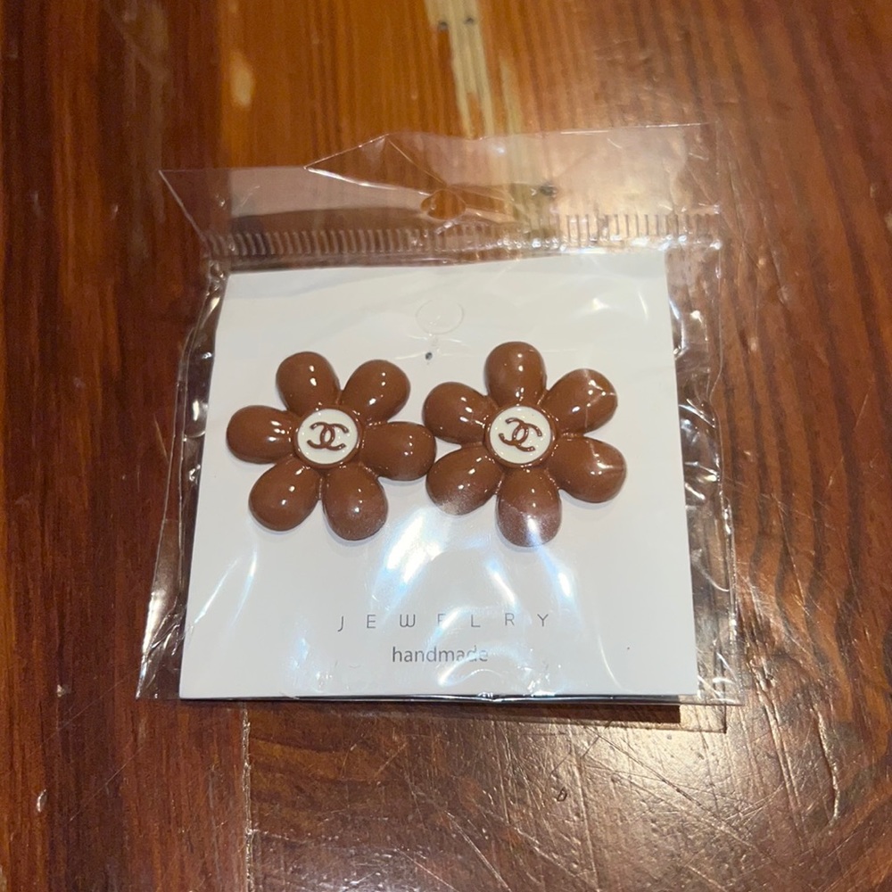 brown CC letter earrings